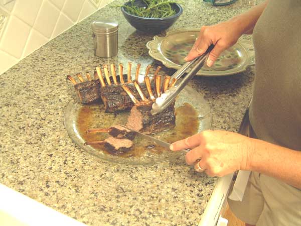 Slice meat between rack of lamb bones