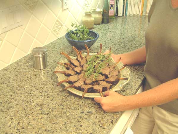 Spread the cut up lamb, garnish as desired, and serve.