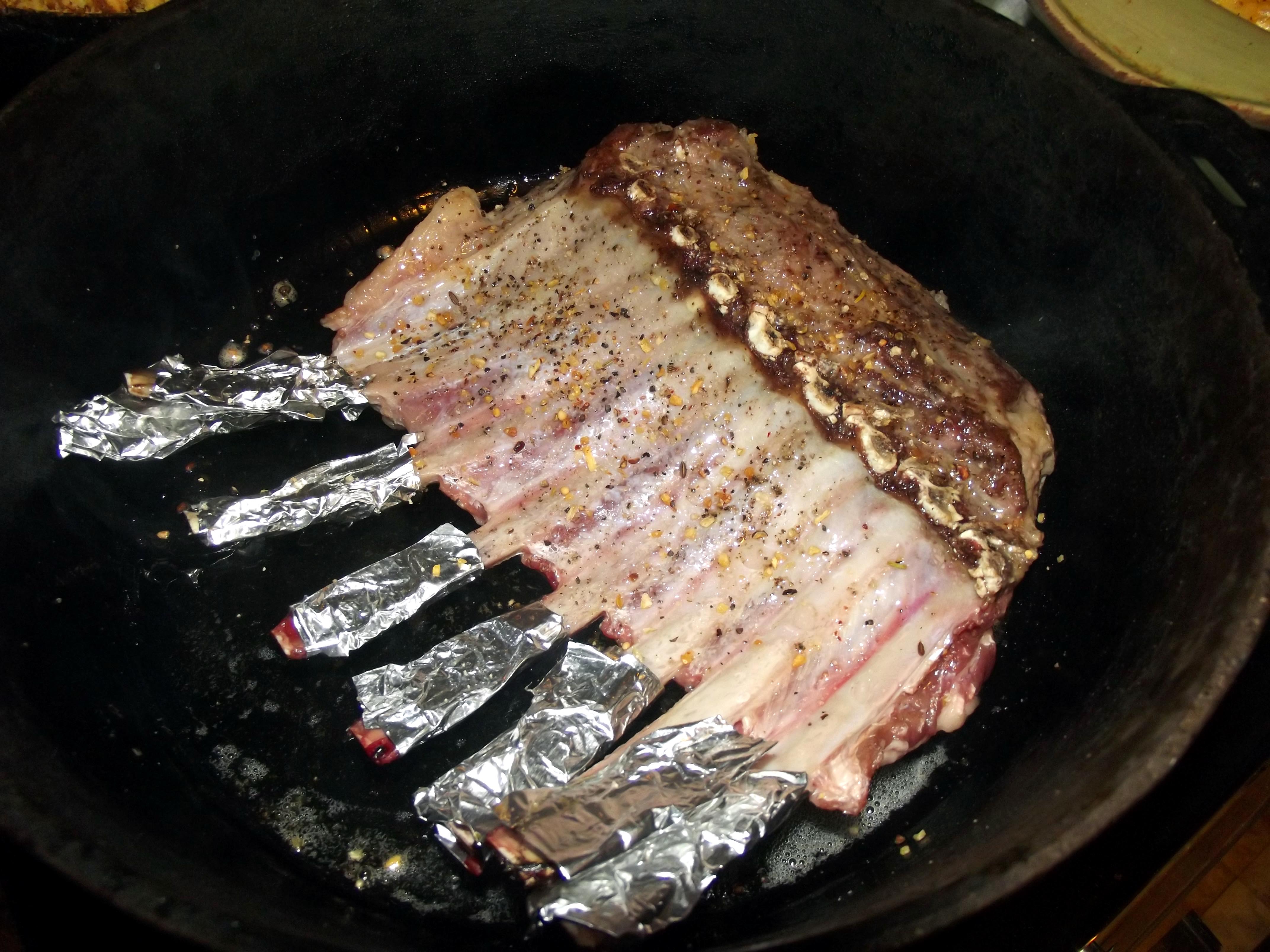 Tinfoil wrapped rack-of-lamb bones